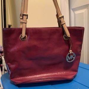 Pink Michael Kors shoulder bag with tan straps